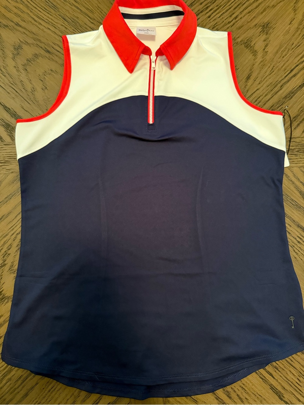 Belyn Key Navy White Red Sleeveless Zip Polo